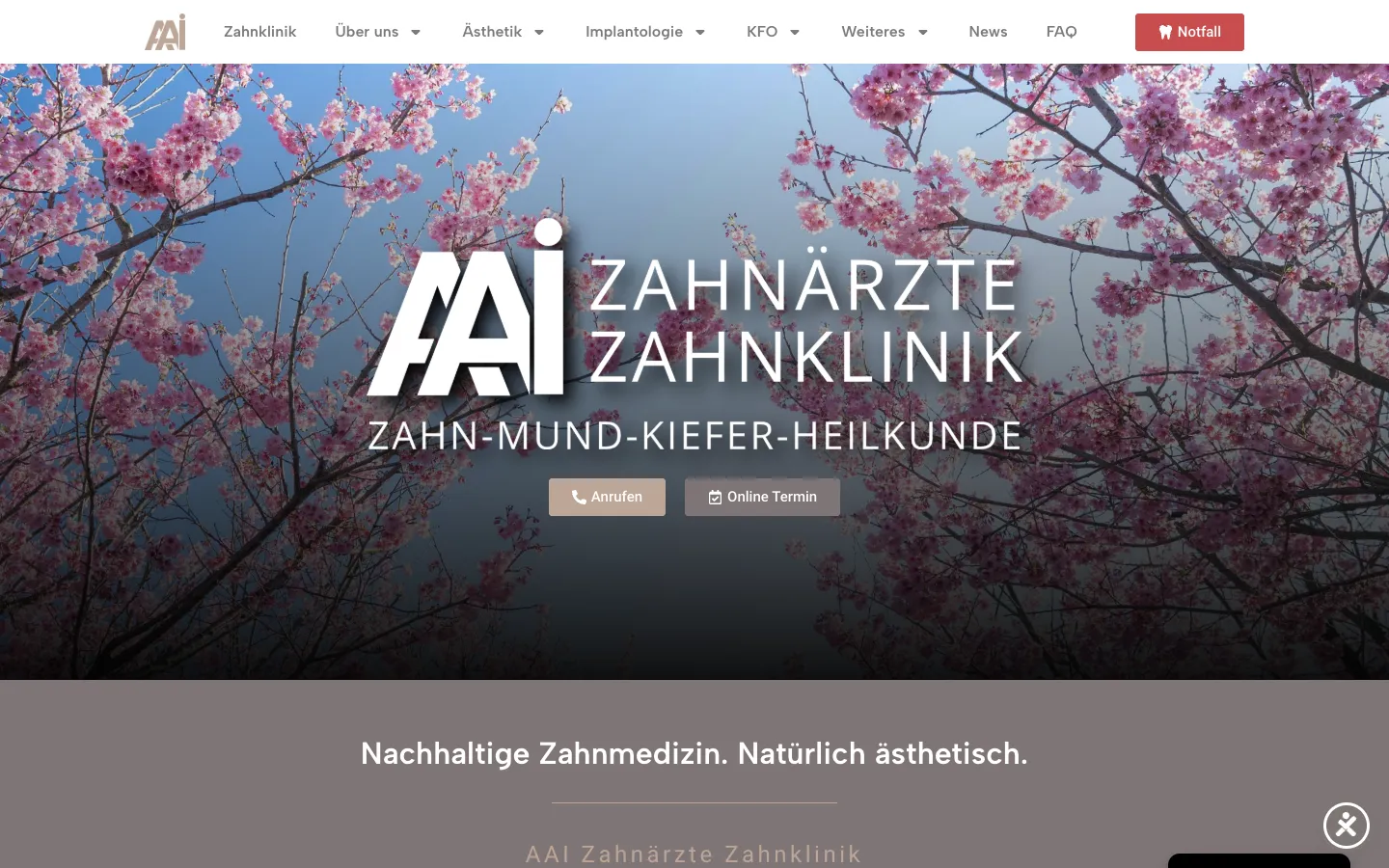Startseite der AAI Zahnärzte Zahnklinik mit Kirschblüten und Logo